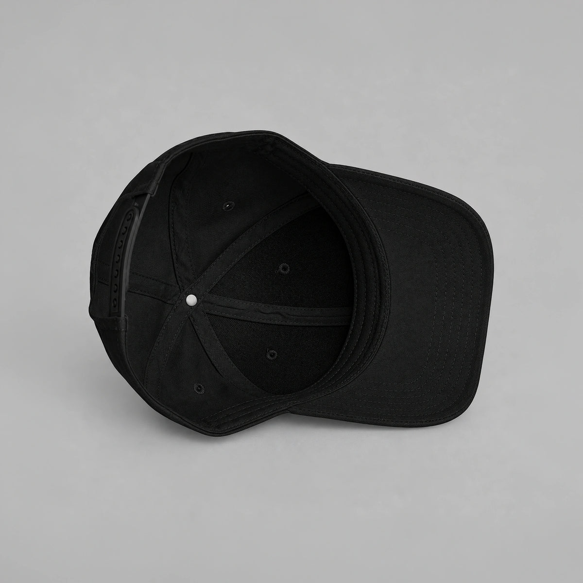Black Vanture Icon Cap shown from the inside with adjustable strap and tonal stitching