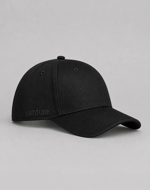 Side view of the black Vanture Icon Cap showing tonal Vanture embroidery