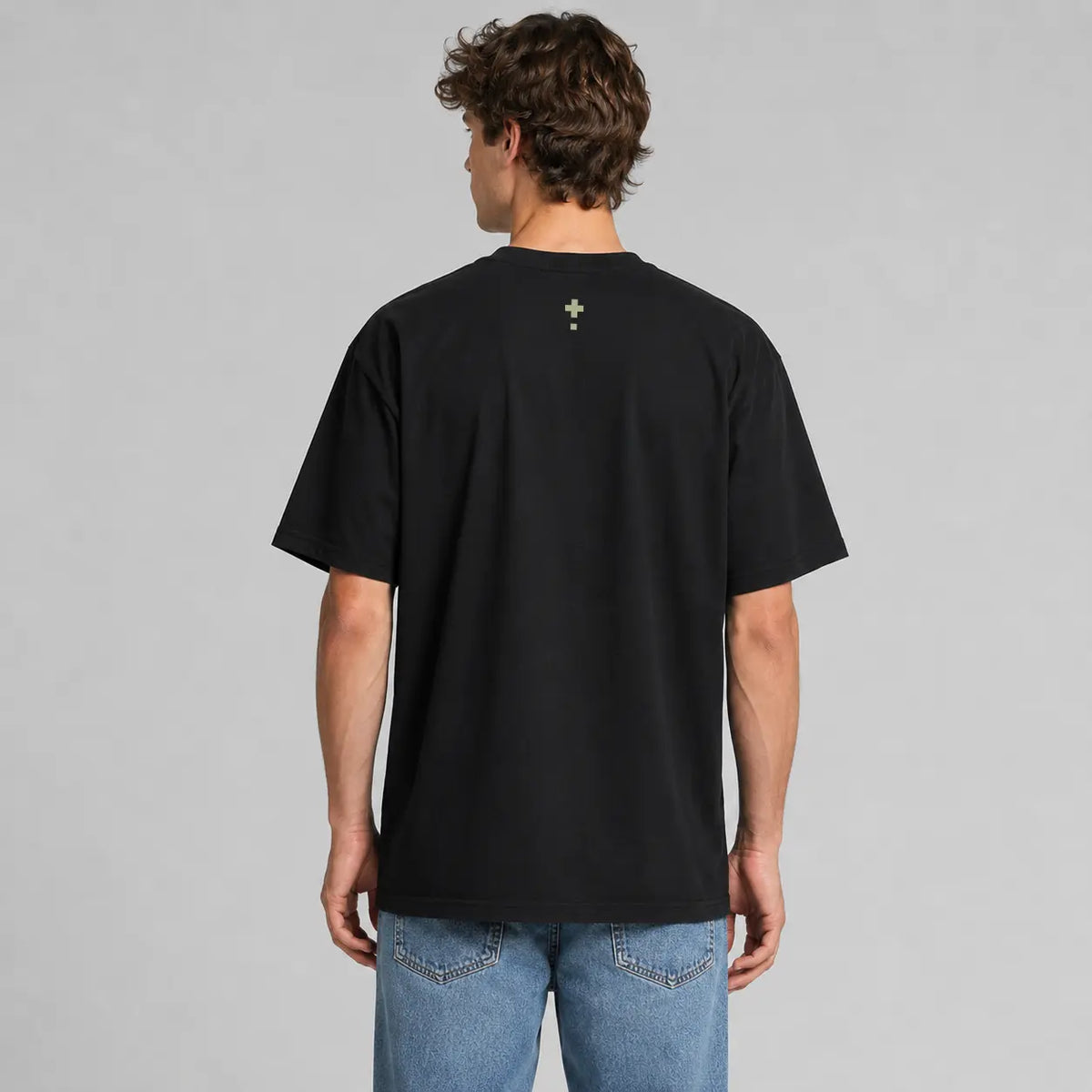 Rear view of the black Vanture Icon Tee showing the small icon print at the upper back