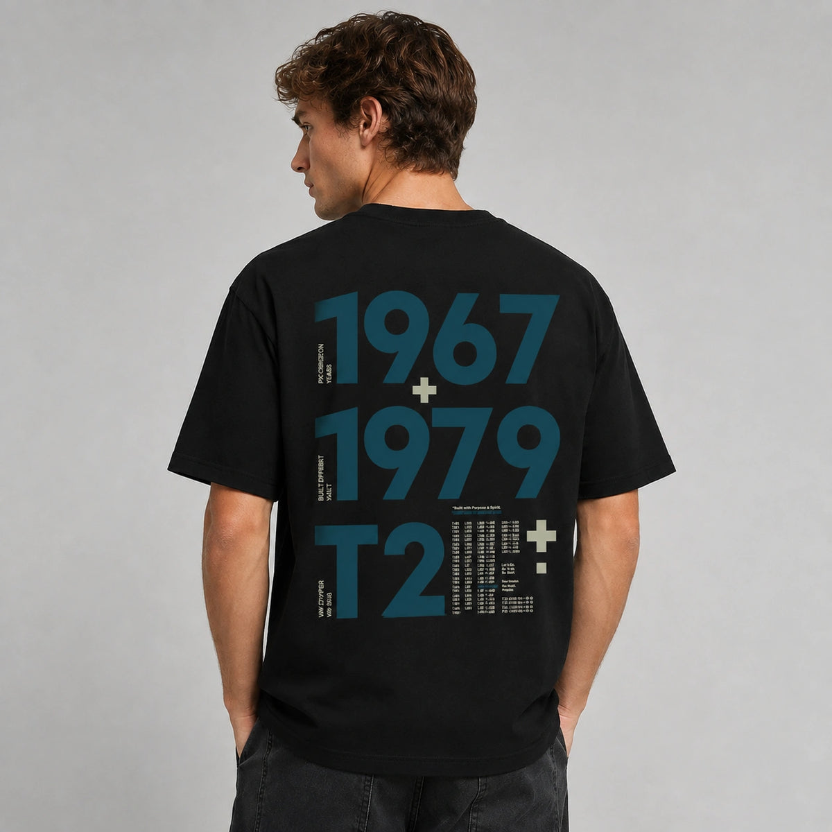 Rear view of the black Vanture T2 Era Tee showing the 1967–1979 back artwork