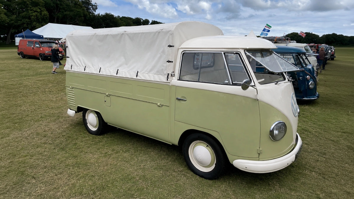 Volkswagen T1 single-cab in Sand Green with a white canvas cover