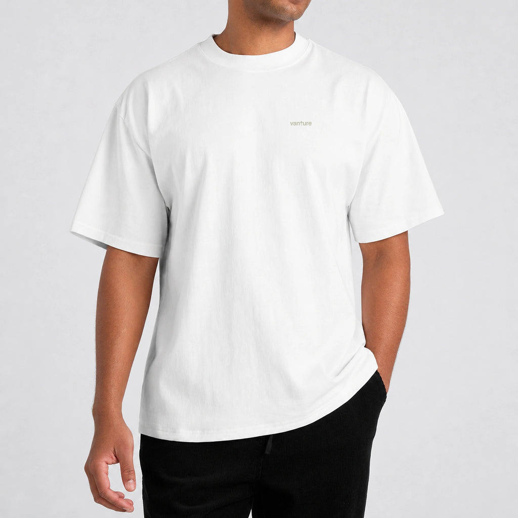 Model wearing the Vanture Your Journey T-shirt with small chest logo