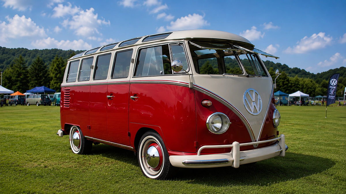 Volkswagen T1 in Beige Grey and Sealing Wax Red parked on grass